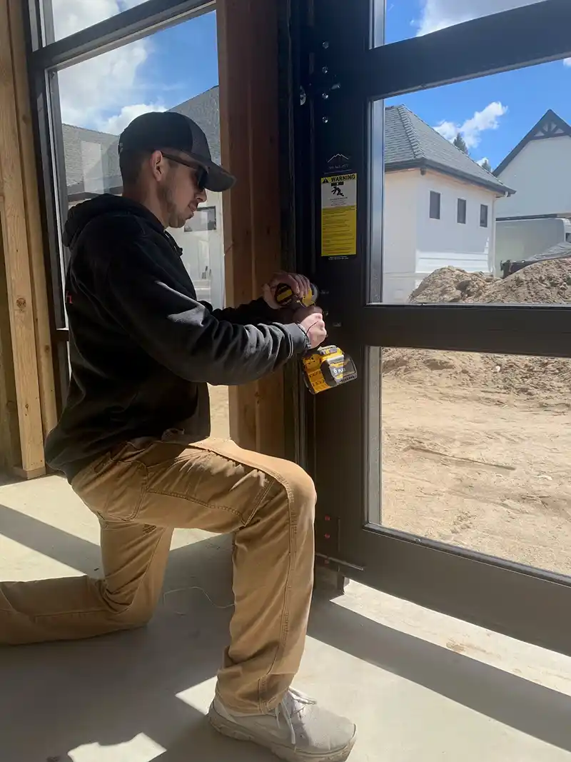 Sawtooth garage door repair technician working on a garage door in Boise