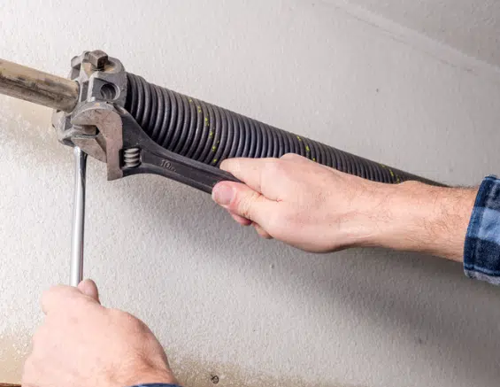 Know the Signs of a Broken Garage Door Spring Before It Stops You Cold