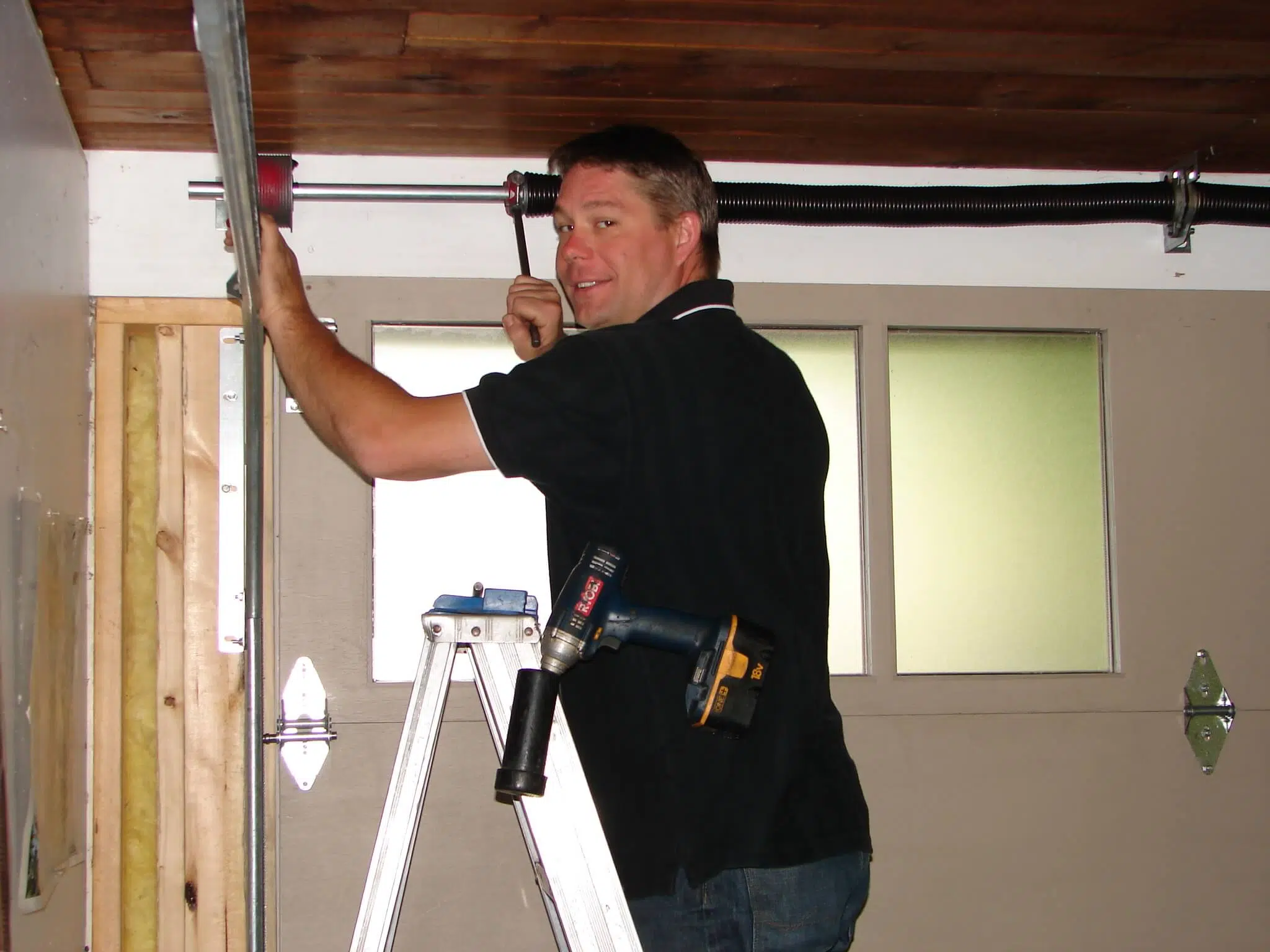 Why Fixing a Broken Garage Door Spring Yourself Is Never Worth the Risk